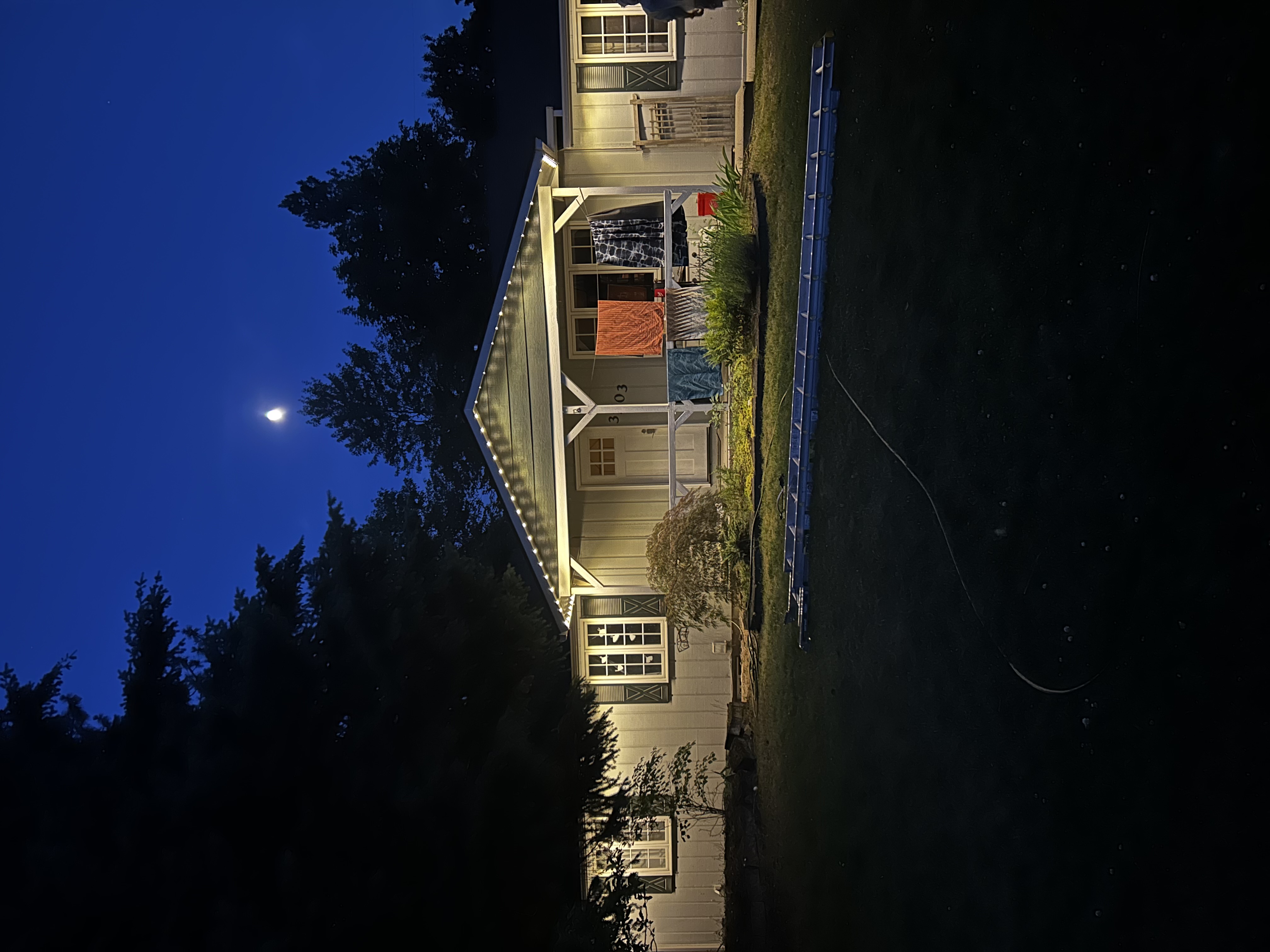 Warm White Roofline at Dusk — permanent exterior lighting in Front porch